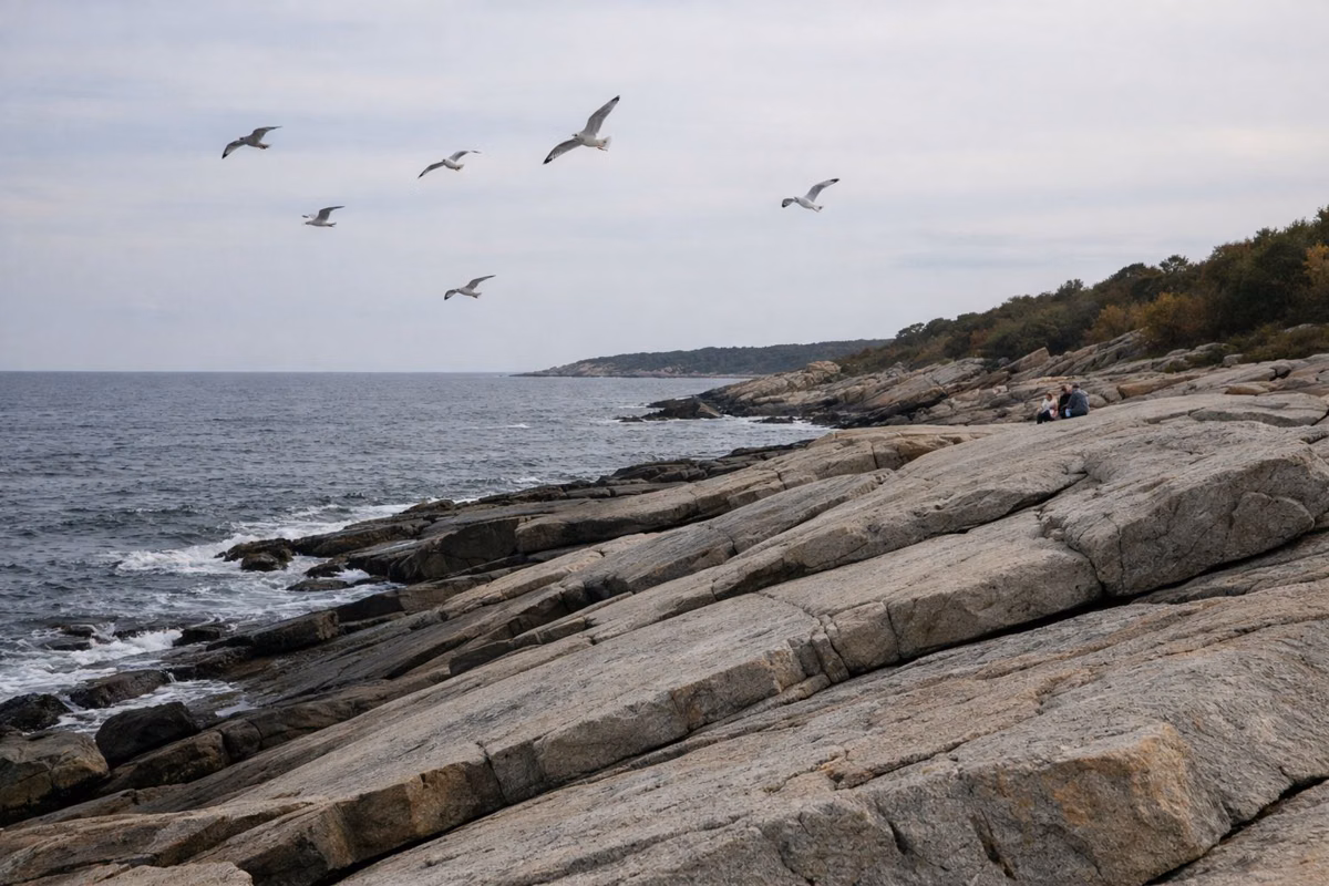 Broad granite ledges sloping down to the ocean
