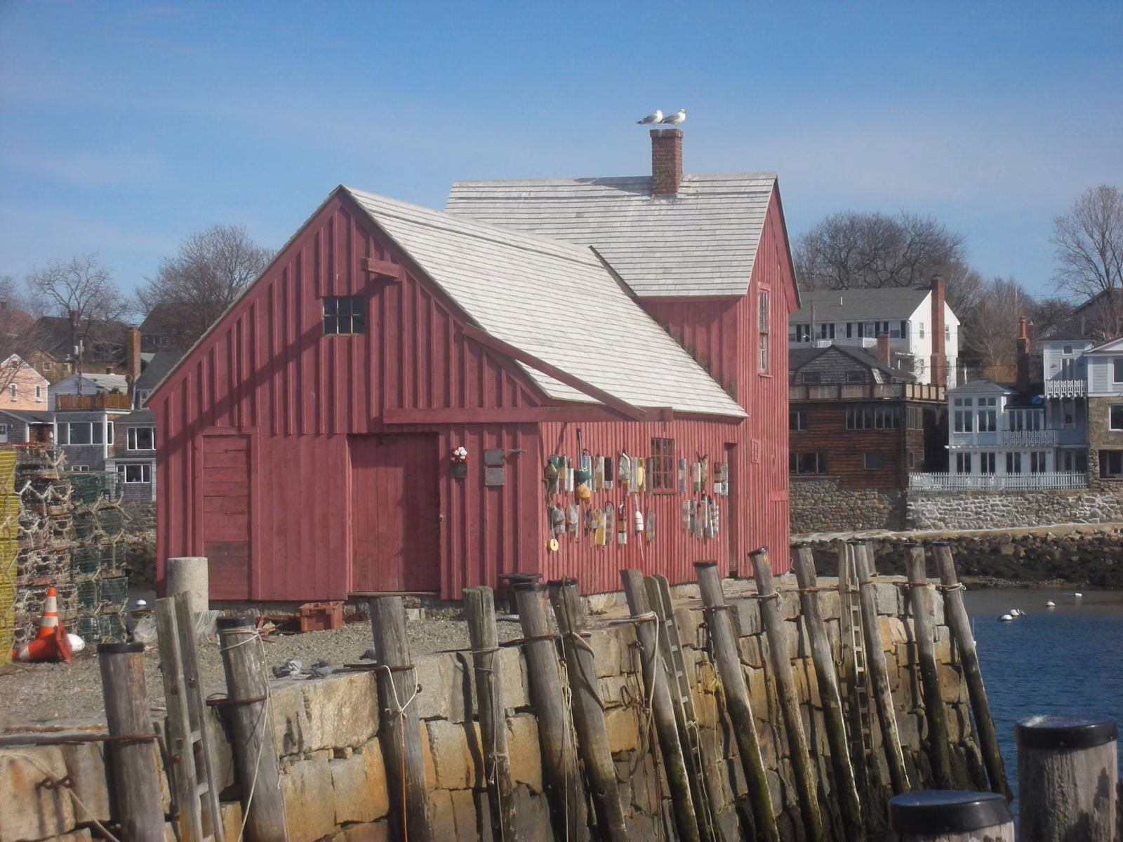 Motif No. 1, a red fishing shack on a granite wharf in Rockport, Massachusetts