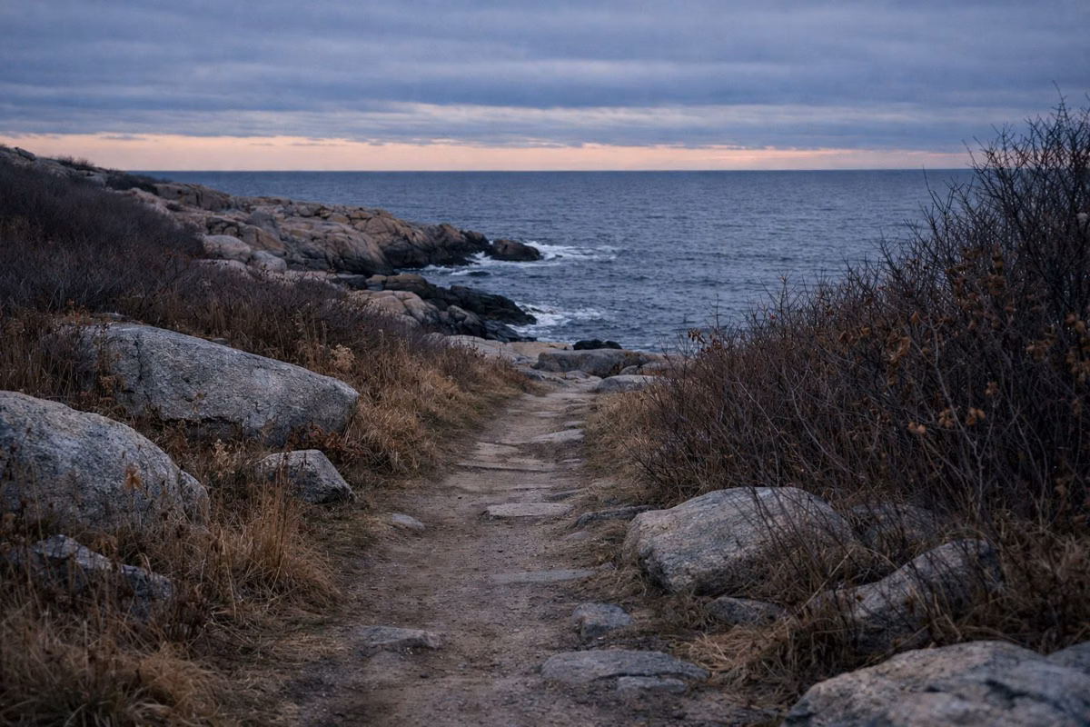 An empty coastal footpath at dusk